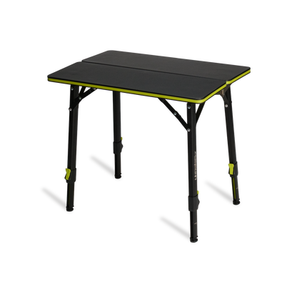 Black folding table with green accents on a white background